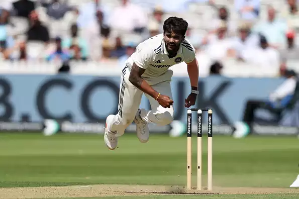 Reddy celebrates after dismissing an English opener.